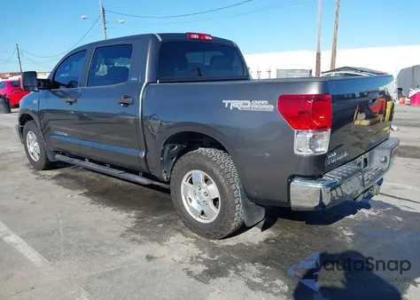 2012 Toyota Tundra Grade 5.7L V8 z USA, uszkodzony, nr VIN 5TFEY5F1XCX122582